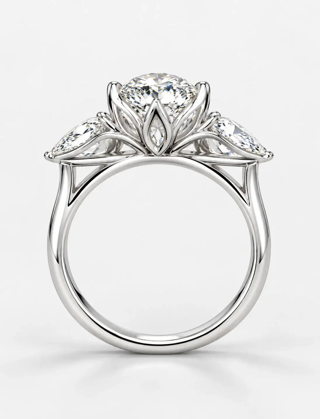 IGI Certified Lab Grown Oval Cut Three-Stone Diamond Engagement Ring with Pear Side Stones in Gold & Platinum