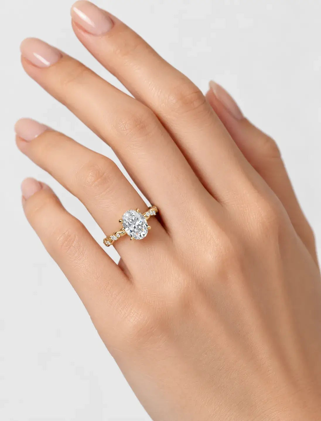 IGI Certified Lab Grown Oval Cut Solitaire Engagement Ring with a Twisted Pavé Band in Gold & Platinum