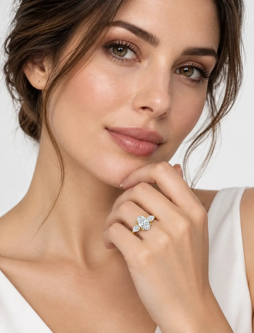 IGI Certified Lab Grown Oval Cut Three-Stone Diamond Engagement Ring with Pear Side Stones in Gold & Platinum