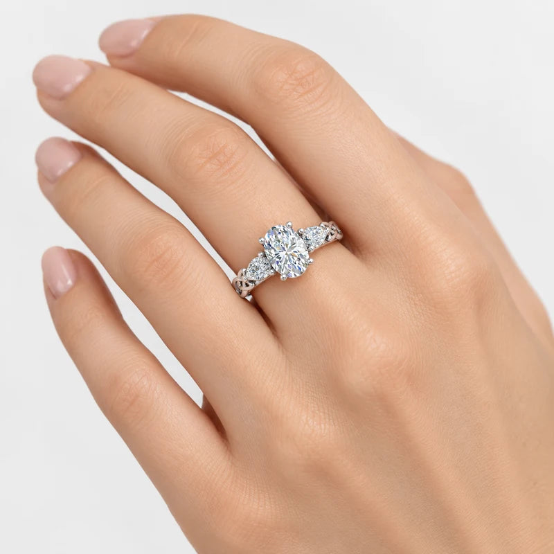 IGI Certified Oval-Cut Three-Stone Celtic Knot Engagement Ring with Pear Side Diamonds in Platinum & Gold