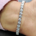 D/VVS 12.00 ct Lab Diamond Claw Set Tennis Bracelet in 9k Gold 7in