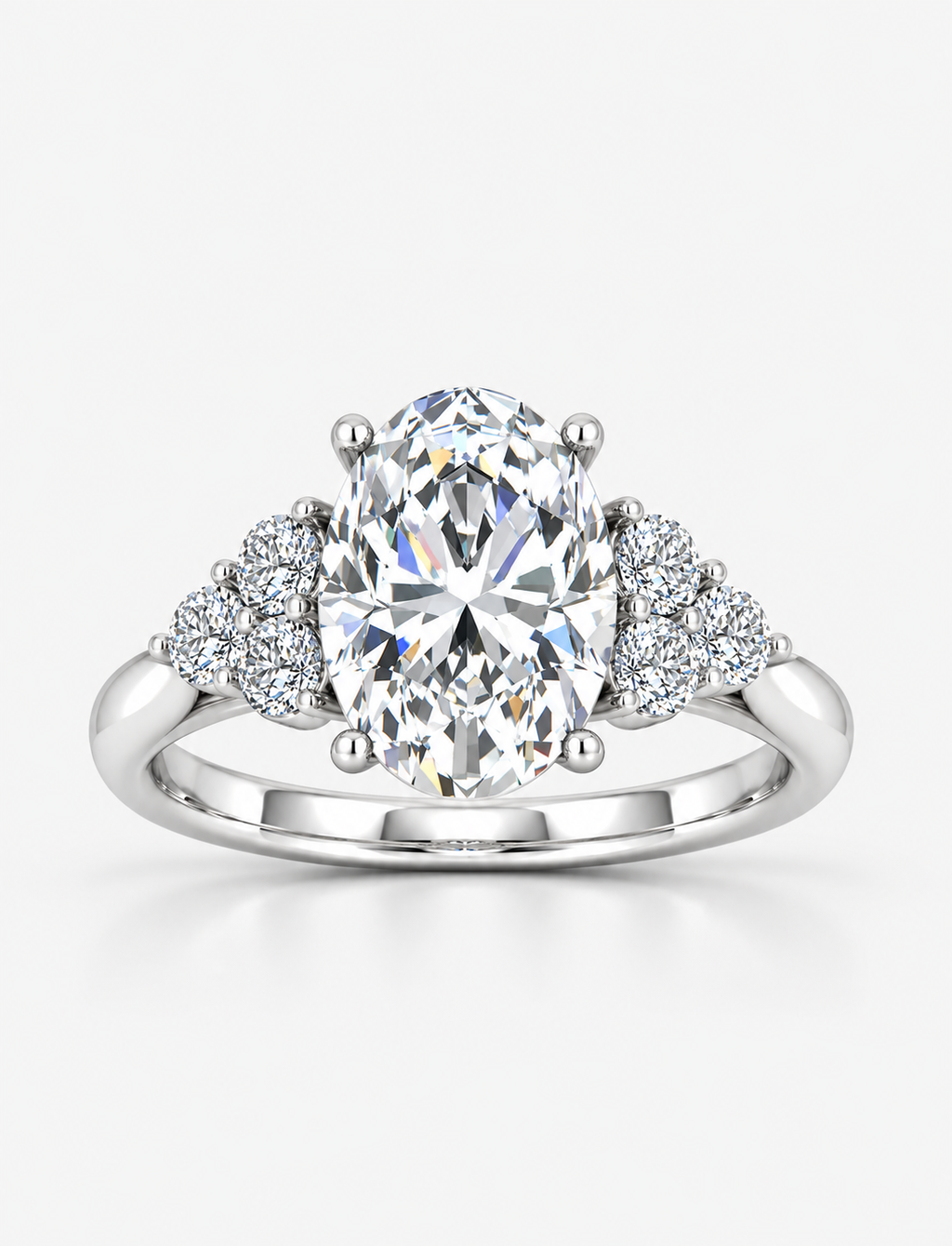 Oval-Cut Diamond Engagement Ring with Cluster Side Stones in Gold & Platinum