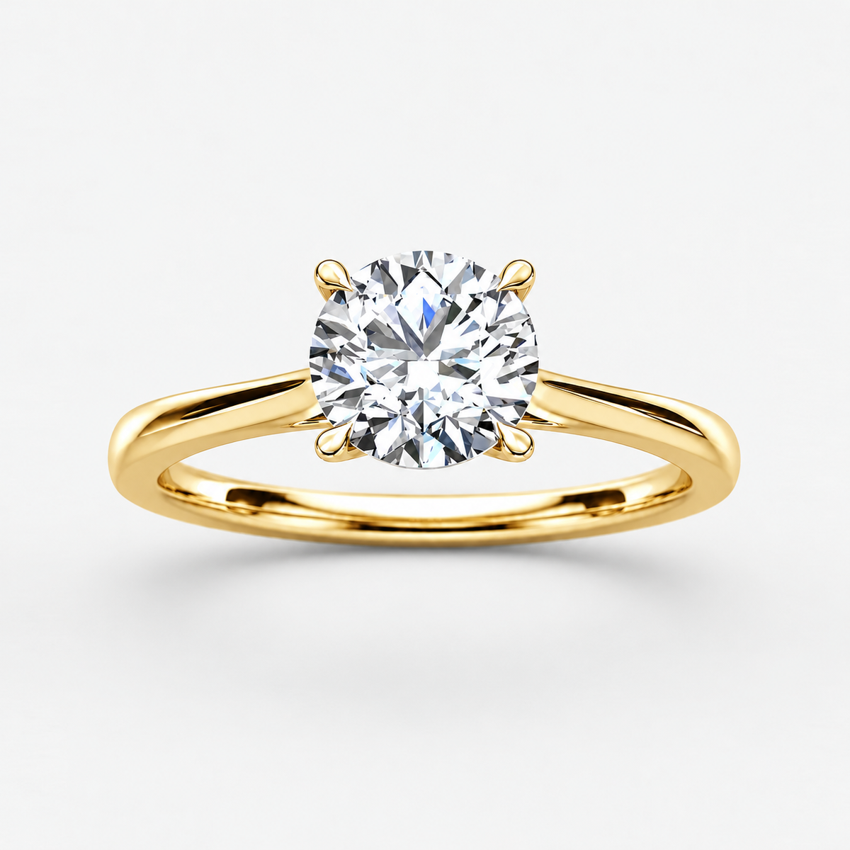 Round Diamond Four Claw Solitaire Engagement Ring Lab Grown in Gold & Platinum