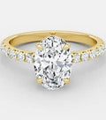 IGI CERTIFIED 4.00CT OVAL D/VS1 WHITH HIDDEN HALO AND DIAMOND ON BAND IN 18K YELLOW GOLD