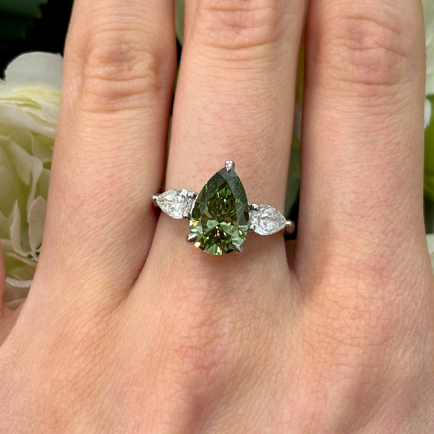 3.20 Carat IGI Lab Fancy Vivid Green Pear & Side Pear Diamond Three-Stone Ring In Platinum