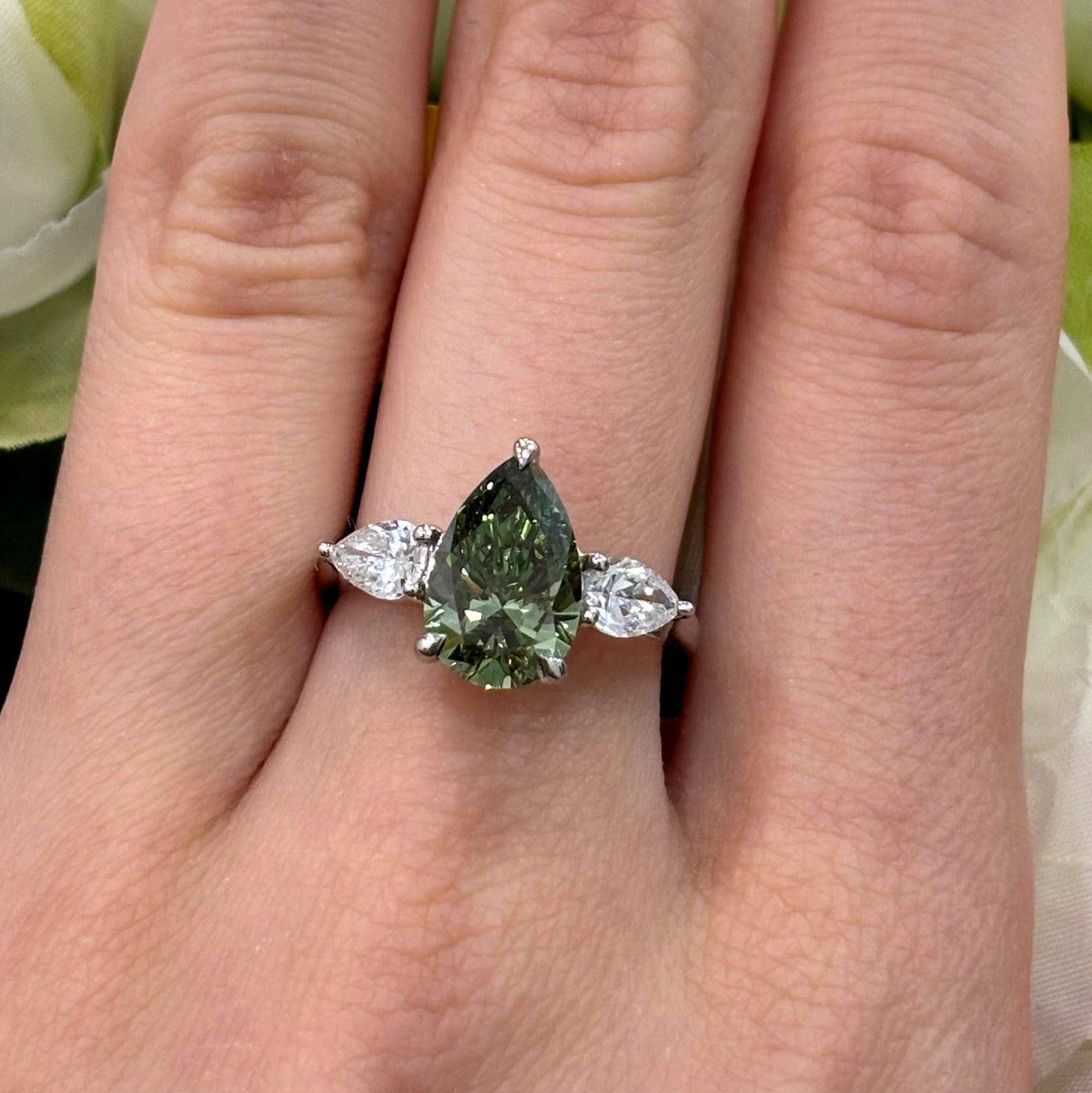 3.20 Carat IGI Lab Fancy Vivid Green Pear & Side Pear Diamond Three-Stone Ring In Platinum