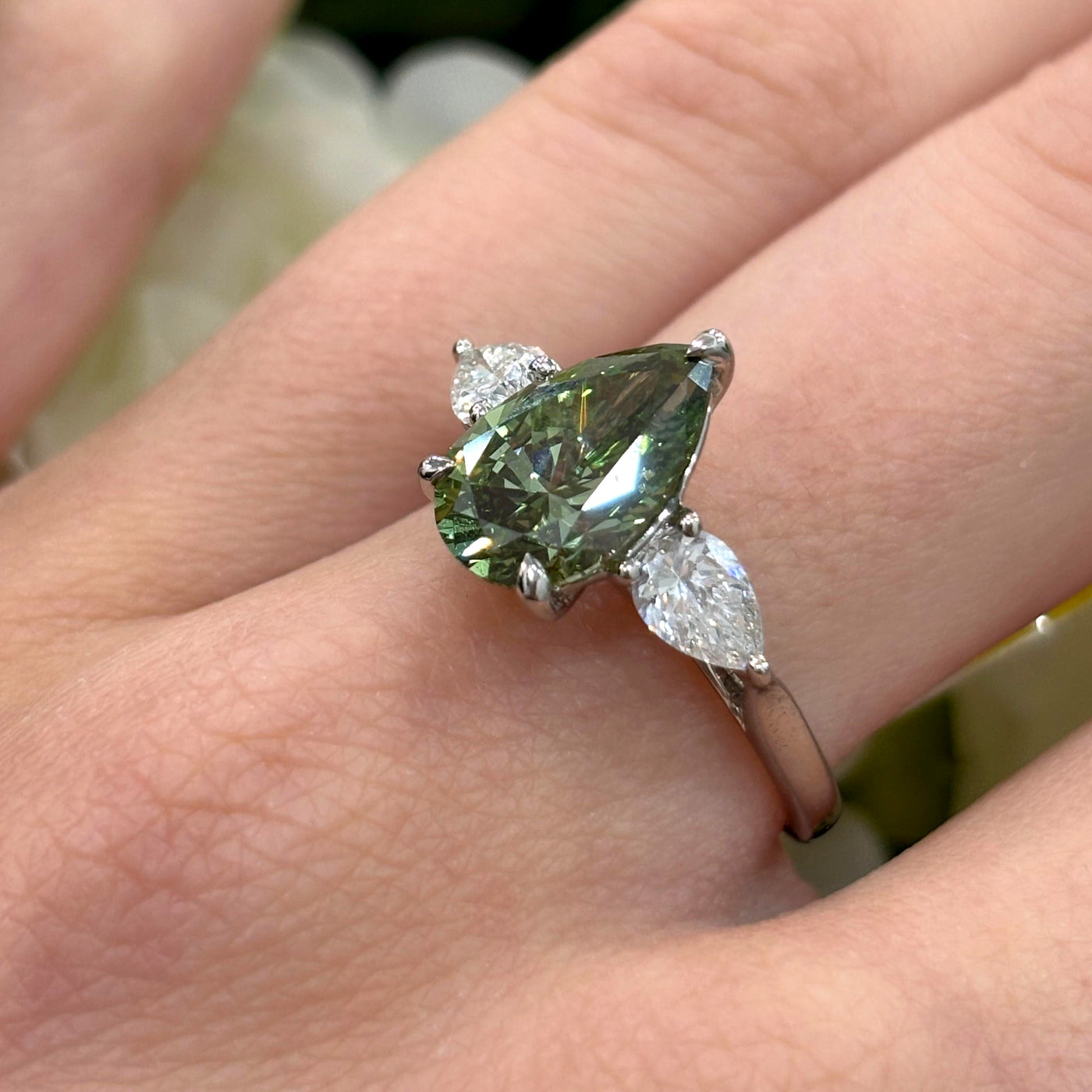 3.20 Carat IGI Lab Fancy Vivid Green Pear & Side Pear Diamond Three-Stone Ring In Platinum