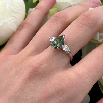 3.20 Carat IGI Lab Fancy Vivid Green Pear & Side Pear Diamond Three-Stone Ring In Platinum