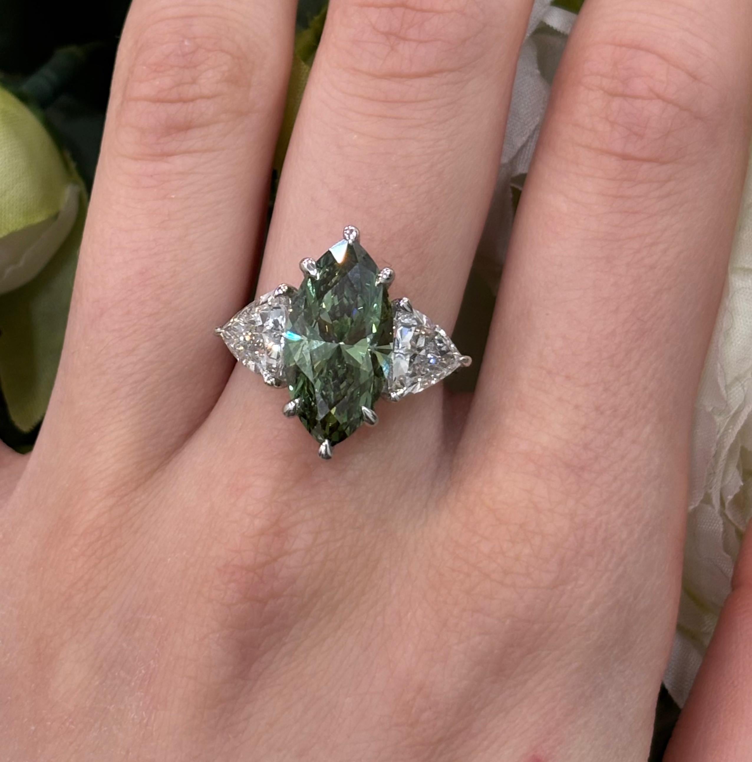 IGI 7.29Carat Lab Grown Fancy Vivid Green Marquise & Side Tapper Baguette Diamond Trilogy Ring  In Platinum