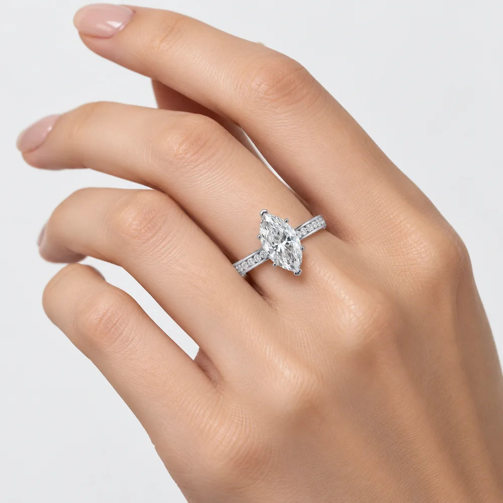 IGI Certified Marquise Cut & Round Side Diamond Channel Engagement Ring in Platinum & Gold - 1–5ct