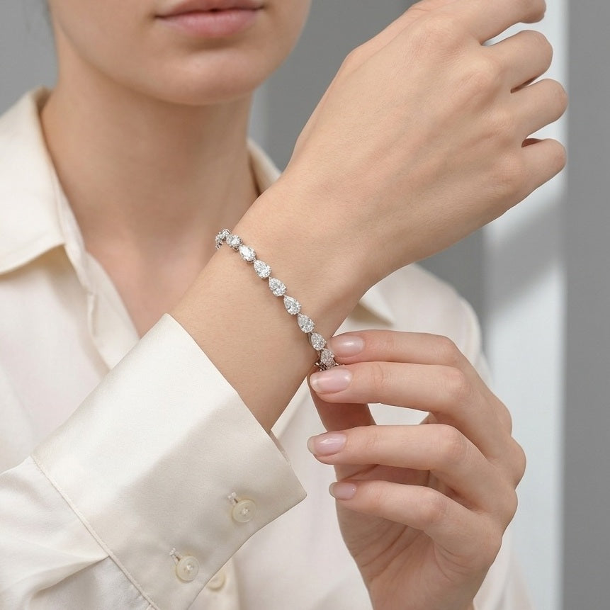 GIA Certified 8.10CT D/VS1-2 Pear Diamond Claw Set Tennis Bracelet in Platinum (950)