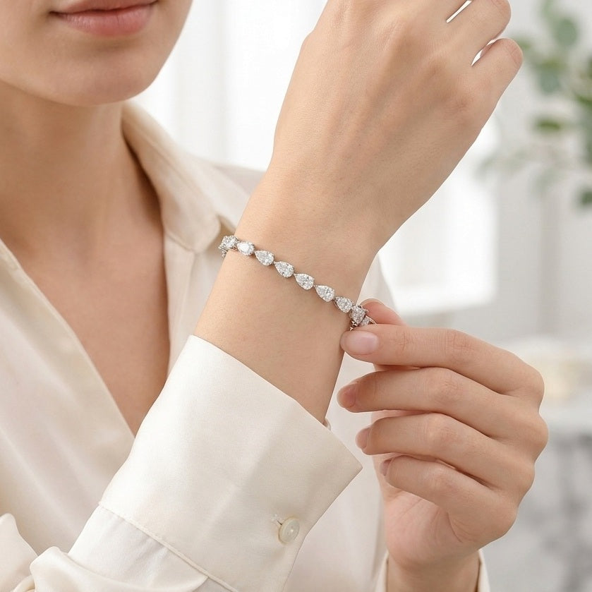 GIA Certified 8.10CT D/VS1-2 Pear Diamond Claw Set Tennis Bracelet in Platinum (950)