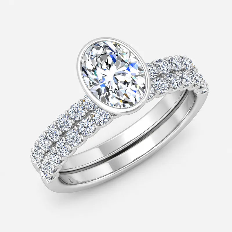 IGI Certified Oval Cut Solitaire Engagement Ring with a Matching Pavé Wedding Bezel Bridal Set in Platinum & Gold
