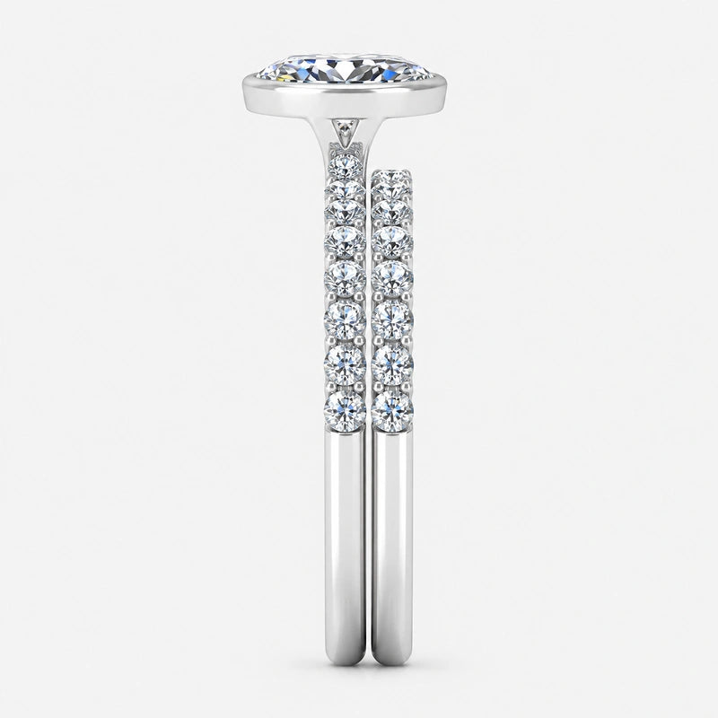 IGI Certified Oval Cut Solitaire Engagement Ring with a Matching Pavé Wedding Bezel Bridal Set in Platinum & Gold