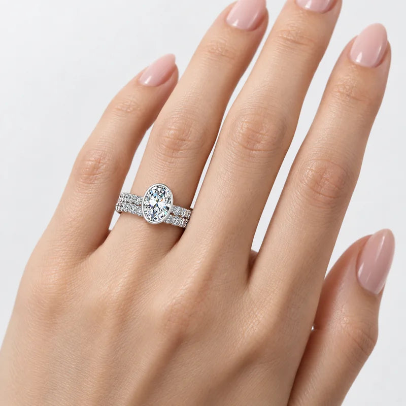 IGI Certified Oval Cut Solitaire Engagement Ring with a Matching Pavé Wedding Bezel Bridal Set in Platinum & Gold