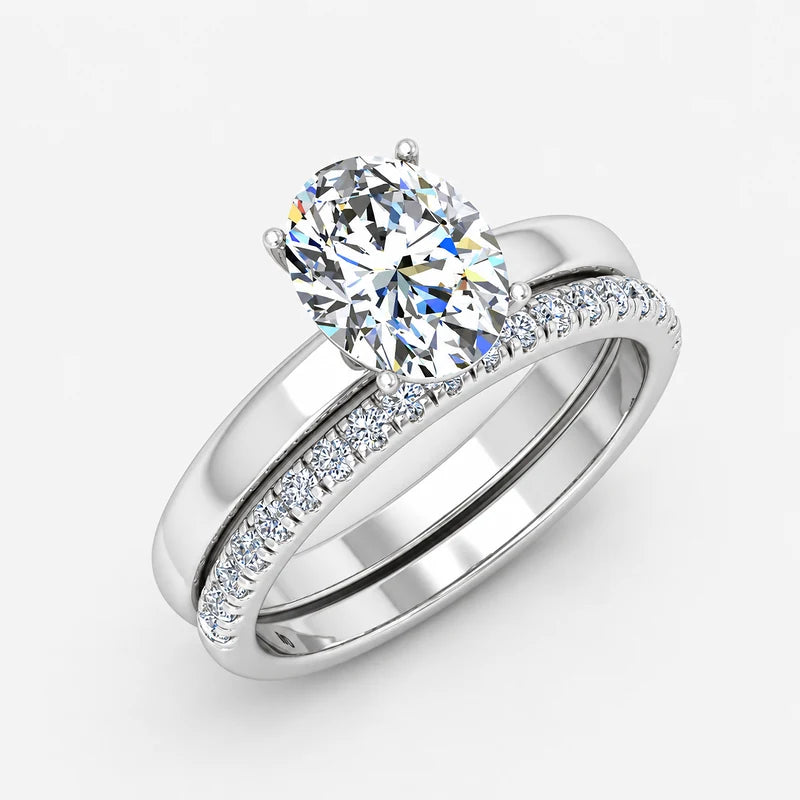 Oval Cut Solitaire Engagement Ring with a Matching Pavé Wedding Band Bridal Set in Platinum & Gold