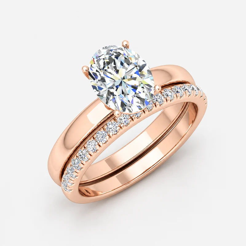 Oval Cut Solitaire Engagement Ring with a Matching Pavé Wedding Band Bridal Set in Platinum & Gold