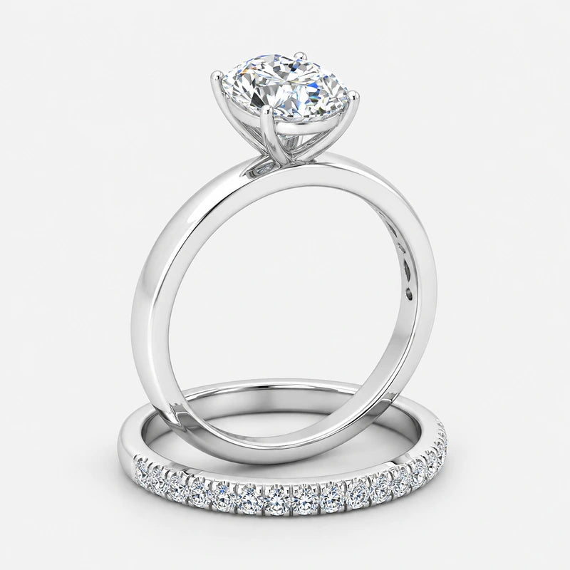Oval Cut Solitaire Engagement Ring with a Matching Pavé Wedding Band Bridal Set in Platinum & Gold