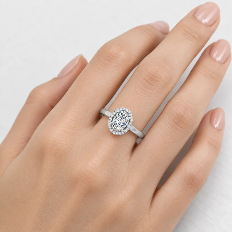 IGI Certified Oval Cut Diamond Halo Set Engagement Ring in Platinum & Gold