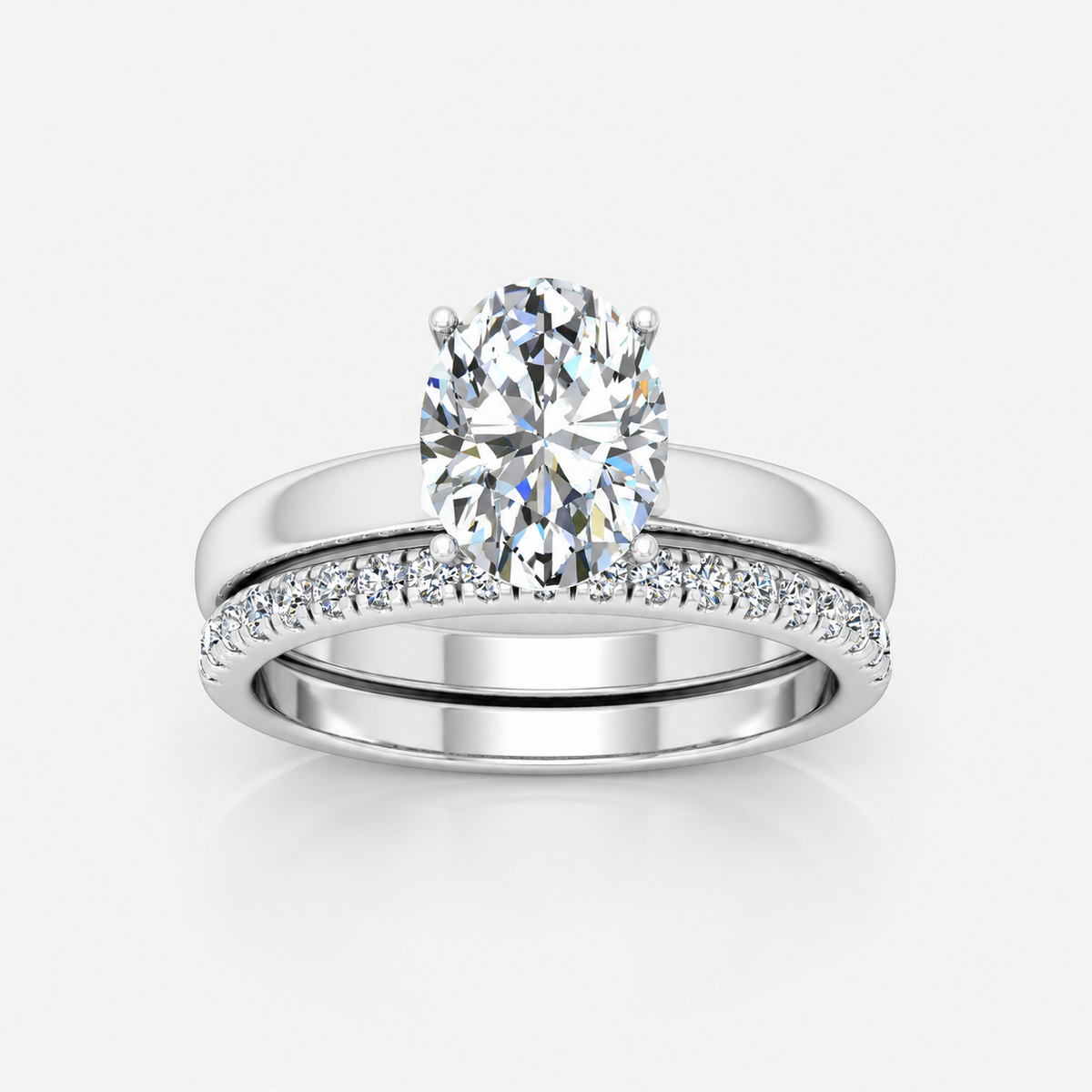 Oval Cut Solitaire Engagement Ring with a Matching Pavé Wedding Band Bridal Set in Platinum & Gold