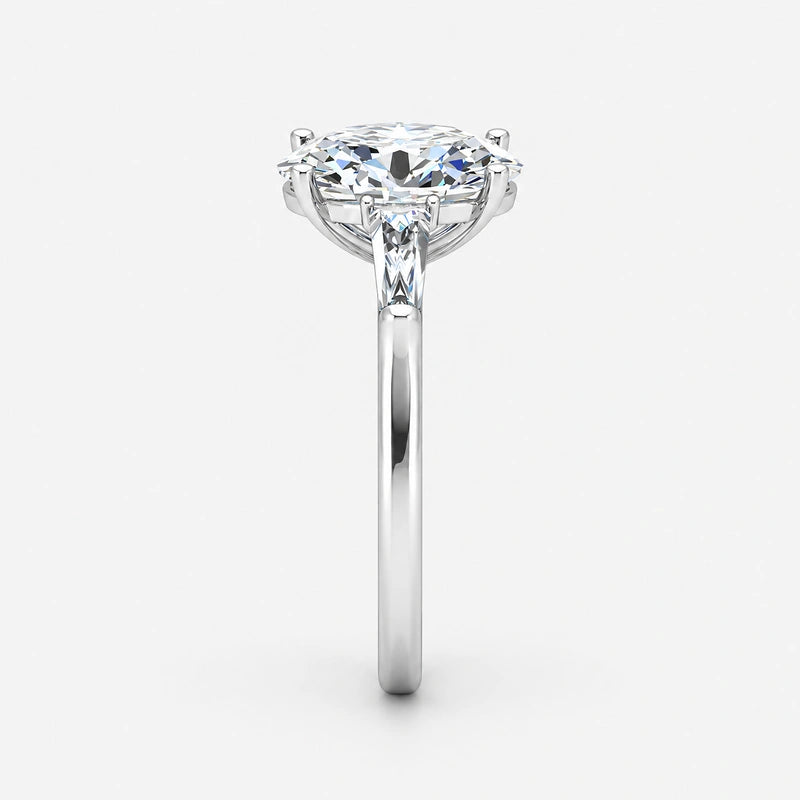 IGI Certified Oval-Cut Diamond Three-Stone Engagement Ring with Tapered Baguettes in Platinum & Gold