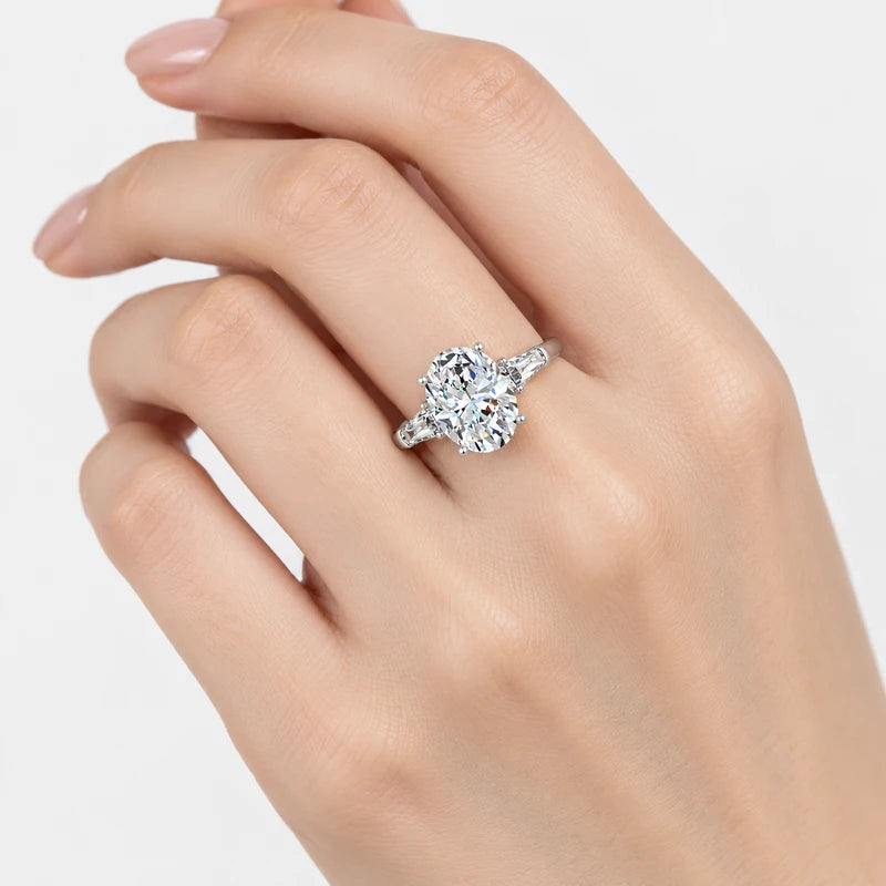 IGI Certified Oval-Cut Diamond Three-Stone Engagement Ring with Tapered Baguettes in Platinum & Gold