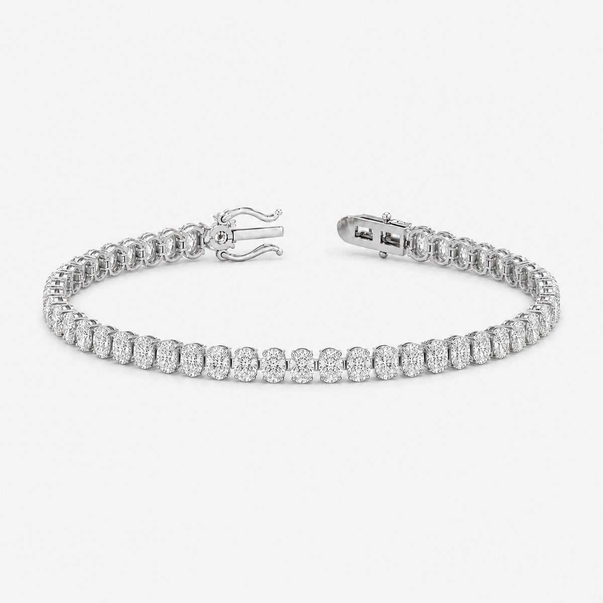 Vertical Oval Diamond Vertical Tennis Bracelet in Gold & Platinum (6Ct-30Ct)