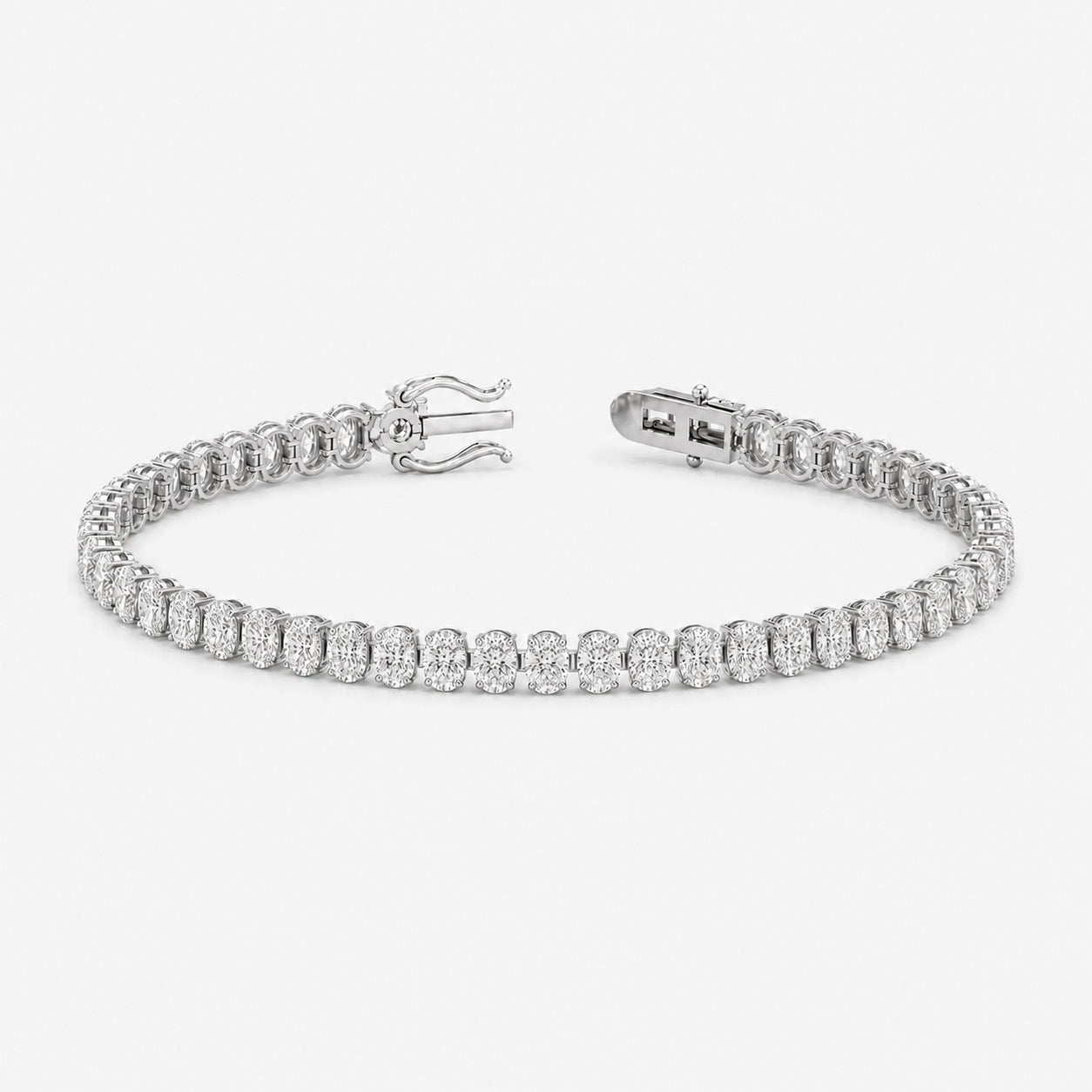 Vertical Oval Diamond Vertical Tennis Bracelet in Gold & Platinum (8Ct-30Ct)