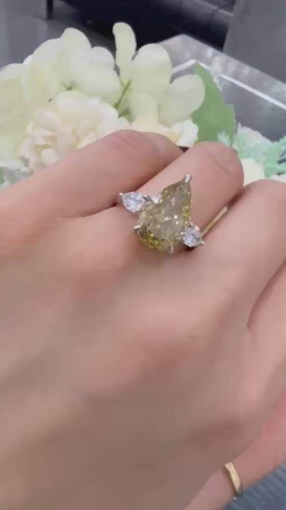 Pear Diamond Fancy Intense Yellow Engagement Ring side Pear Trilogy Ring IGI Lab Grown in Platinum