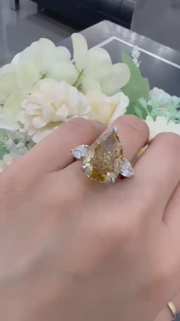 Pear Diamond Fancy Vivid Brownish Engagement Ring side Pear Trilogy Ring IGI Lab Grown in Platinum