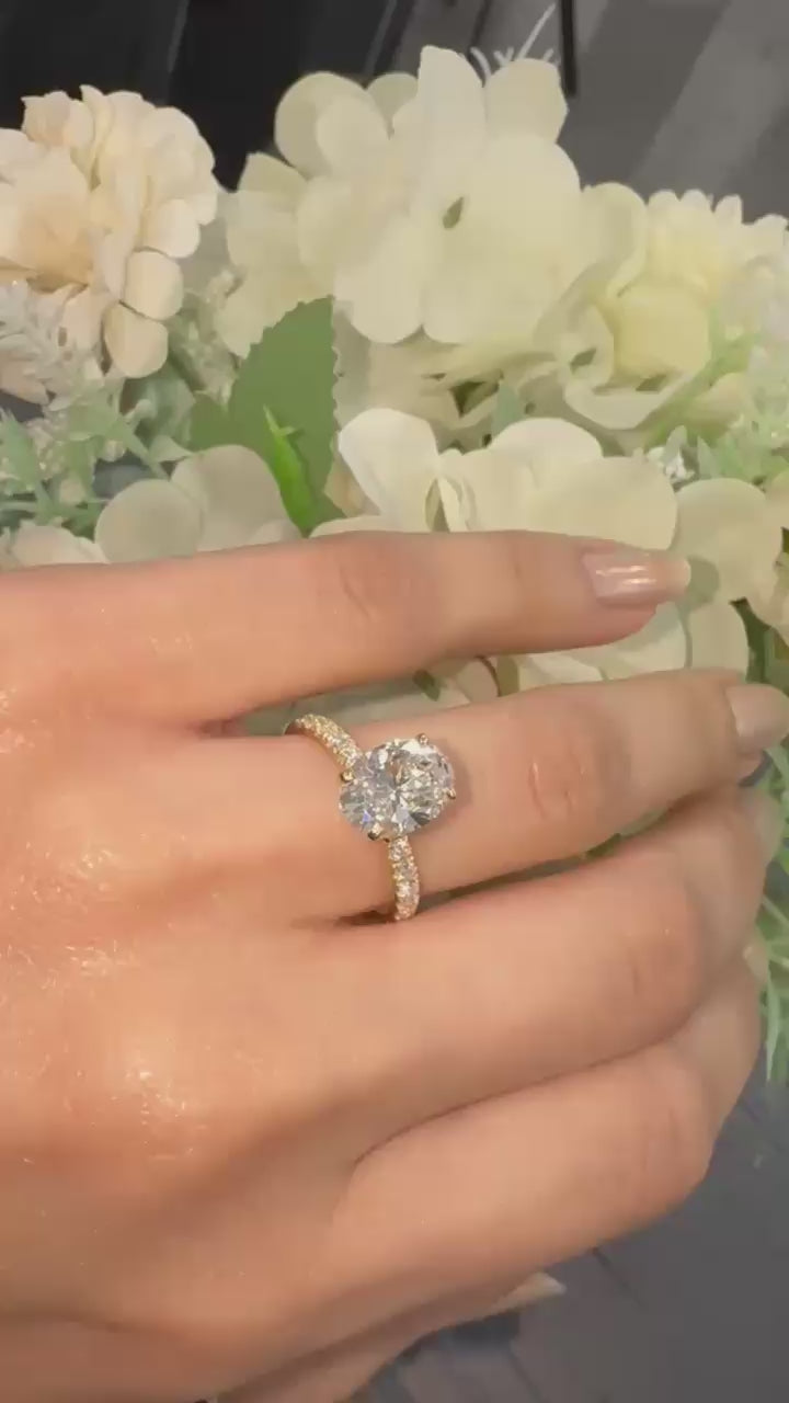 IGI Certified 2.00 Carat E/VS Oval With Side Diamond Hidden Halo Engagement Ring In 18K Yellow Gold