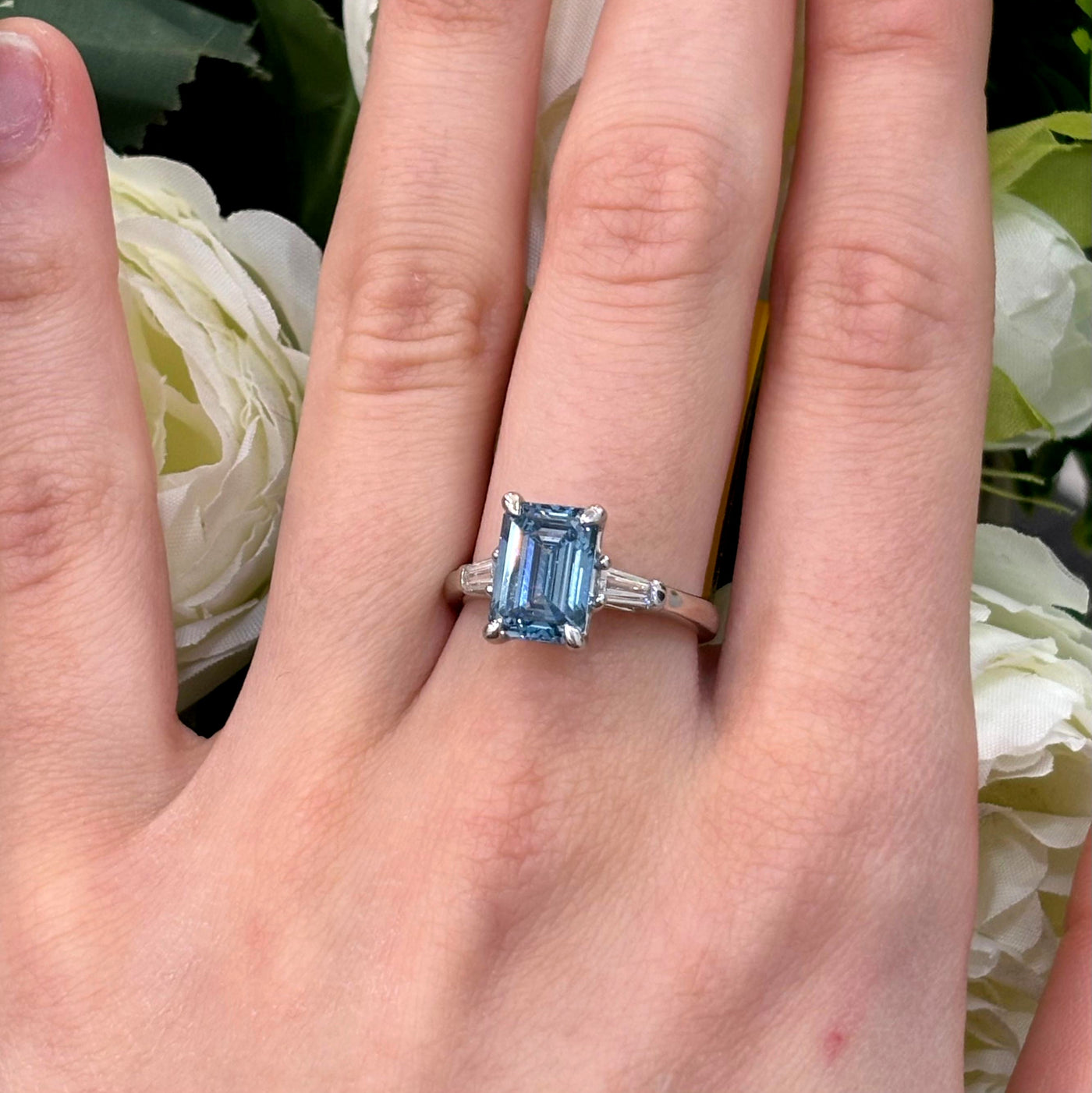 3.70 Carat IGI Lab Fancy Vivid Blue Emerald & Side Tapper Baguette Diamond Three-Stone Ring In Platinum