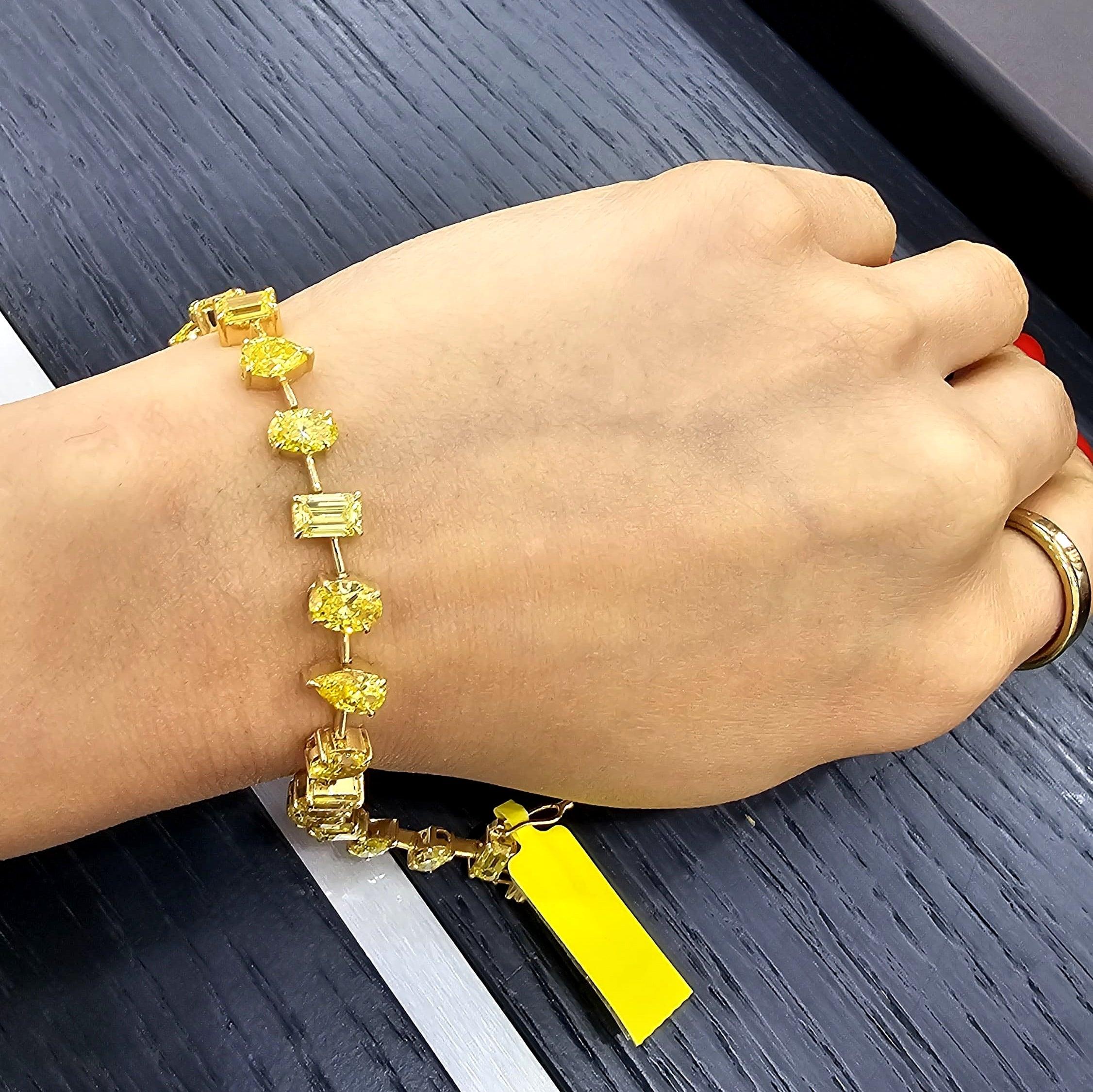 12.04Ct, Multi Shape Fancy Vivid Yellow Diamond Tennis Bracelet In 18K Yellow Gold - 15Grams