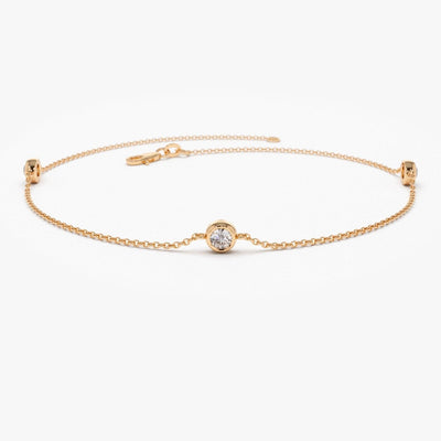 3 ROUND DIAMOND CHARM BRACELET CRAFTED IN 18K YELLOW GOLD