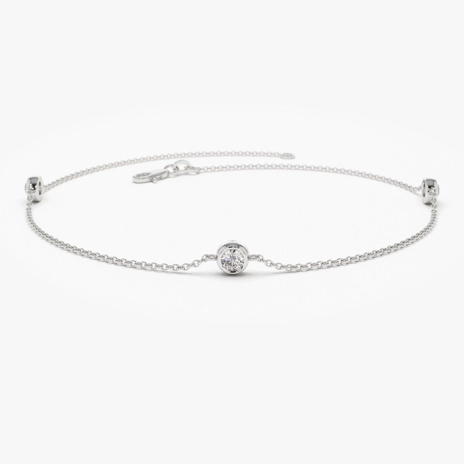 3 ROUND DIAMOND CHARM BRACELET CRAFTED IN 18K WHITE GOLD